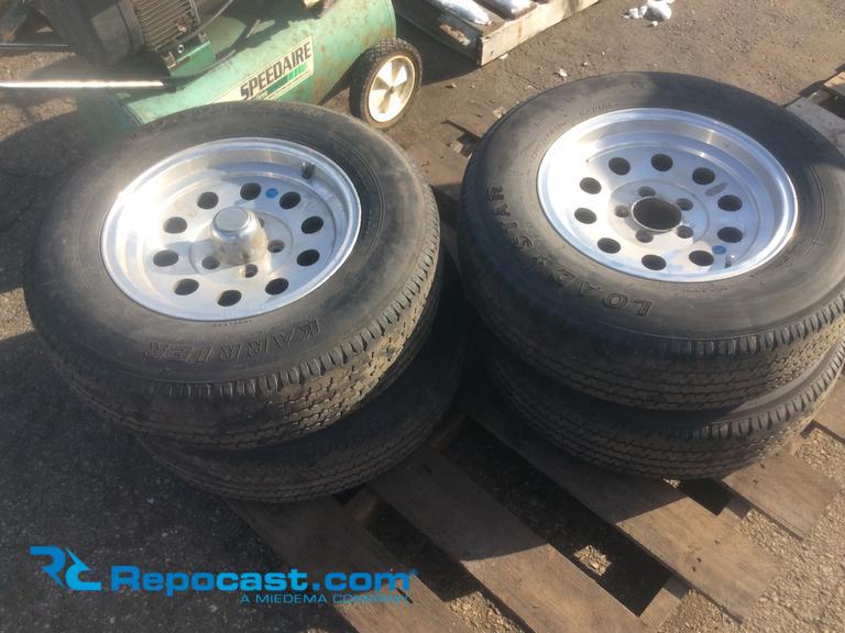Lot of (4) aluminum trailer tires and...