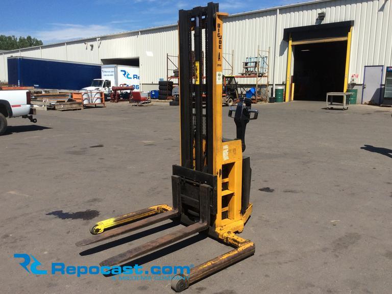 Big Joe walk behind forklift, model#PDI 24-T10, max capacity-2000 pounds, 120" lift height, 24 V,...