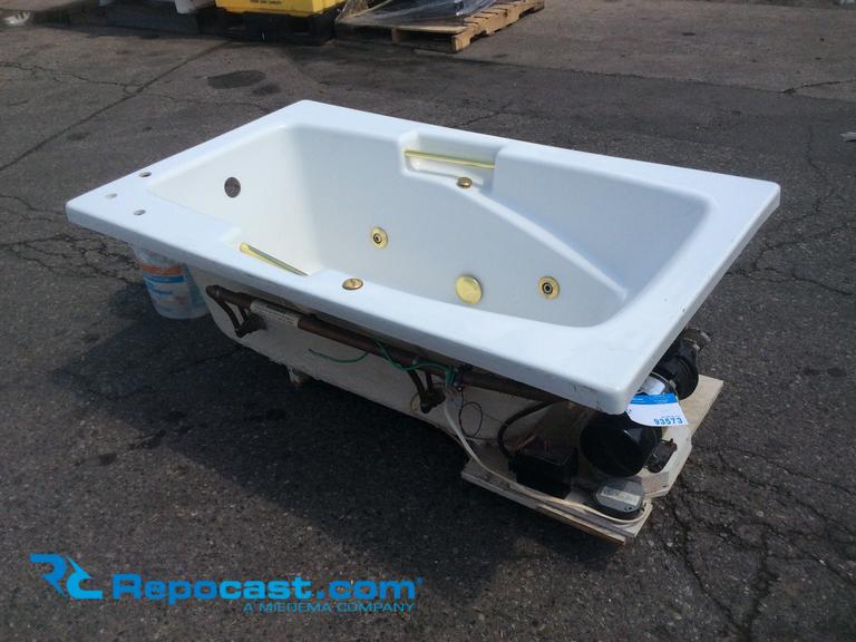 Aqua Glass, fiberglass whirlpool  jacuzzi tub, 4 jets, gold colored hardware, said to have been...