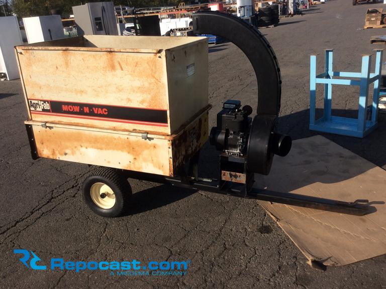 Agri-fab mow-n-vac 5 hp model 45-0188-0267, 10 cu ft., approximately 100" long, 33" wide, 57" tall. 