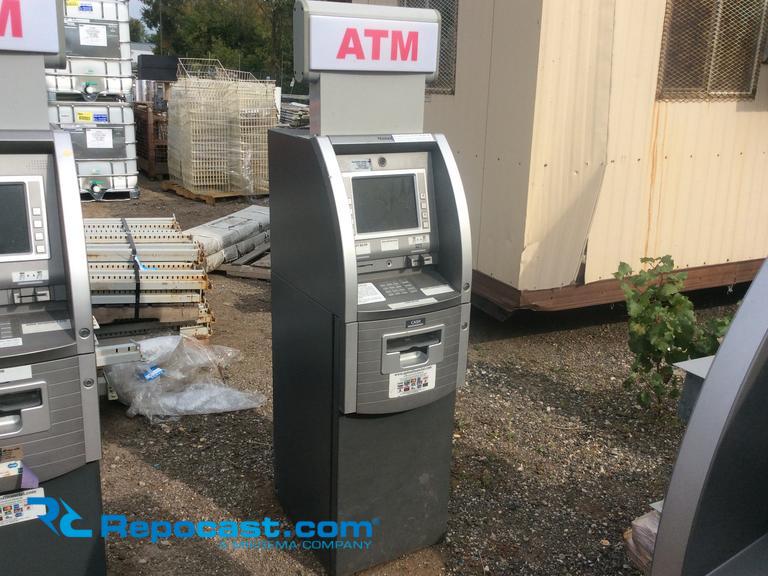 Tranax ATM machine, unable to locate model number or spec tag because machine is locked without...