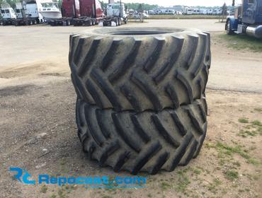Lot of (2) Titan 30.5x32 combine tires, 12-ply rating, used.