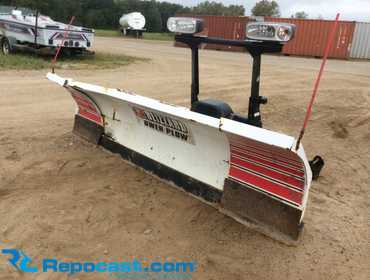 8’ Blizzard Power Plow front blade with 22” extendable wings, bolt on metal cutting edges, power...