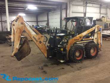 Bobcat 743 Skidsteer Loader with Bobcat 909 Backhoe Attachment