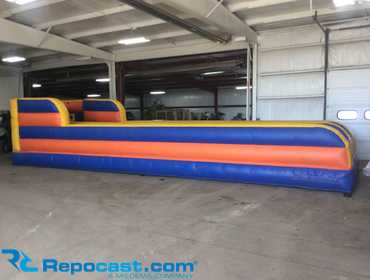 Games to Go Bungee Run Inflatable, approx. 34’x11’ wide, comes with blower, bungee cords, and...