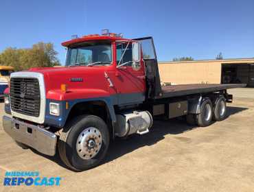 1989 Ford L9000 26’ Roll Back Flatbed 1FDYU90L4KVA18914