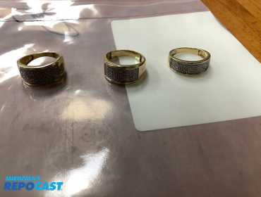 POLICE SEIZED 61-20,    3 gold-colored rings