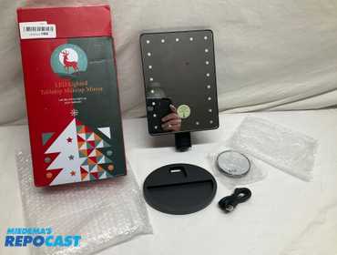 New LED Lighted Tabletop Makeup Mirror. Mirror measures 8 3/4" x 6.5" and has brightness control....