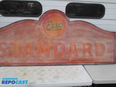 Esso standard oil/gas metal embossed sign, die cut. 78" x 33".