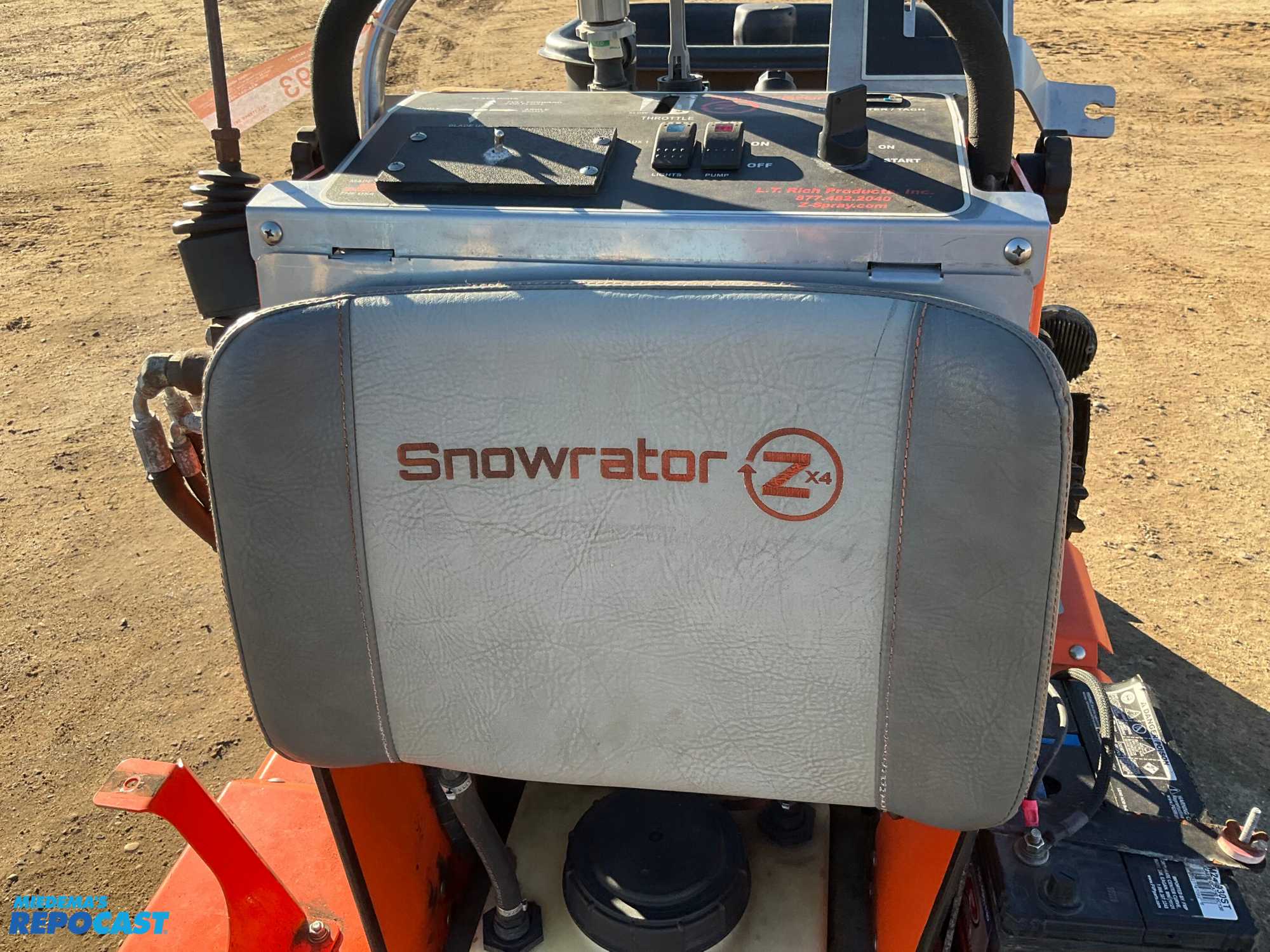 Repocast.com® | Snowrator ZX4 Sidewalk Snowplow Machine