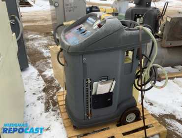 A Robinair 75700 CoolTech Coolant Exchanger