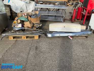 Repocast.com® | Lot of (2) Skids Of Car Parts for 1956...