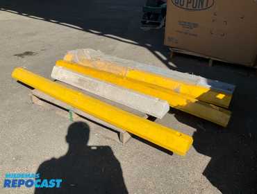 (5) Miscellaneous rubber car stops, (4) are approximately 6’ long and (1) is 4’ long