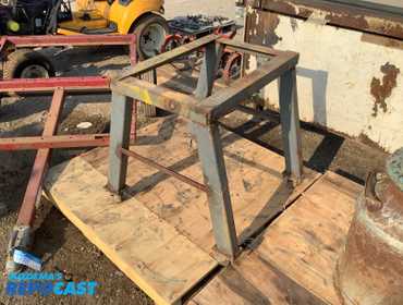 Industrial heavy duty steel work stand on four rolling caster wheels in good condition. Made out...