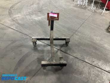 Engine stand on casters, missing three of four mounting arms