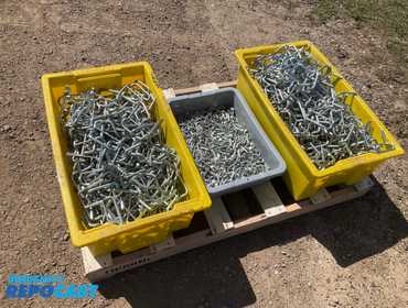 Lot of Speedrack Pallet Racking Clips and Safety Pins, clips measure 4” on center, two totes of...