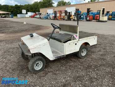 Taylor Dunn 36 Volt Electric Industrial Cart, 6,719 Metered Hours, 31” Long x 44” Wide Flatbed...