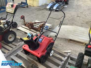 TORO Power clean walk behind snowblower, has electric start option or rope pull starter, has a 21...