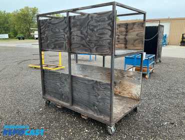 Two shelf metal rack on casters 74”L x 45”W x 79-3/4”T overall, plywood decks on the shelves and...