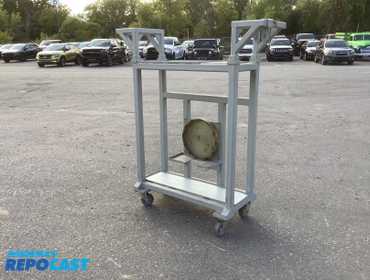 Custom rolling steel cart. Flat top, sliding shakle brackets on sides.  50" L x 15" W x 58" H  ...
