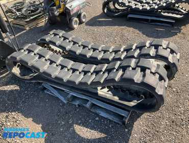 (2) Bridgestone 15”W rubber tracks p/n V0511-2851, came off a Kubota SVL75 skid steer, very...