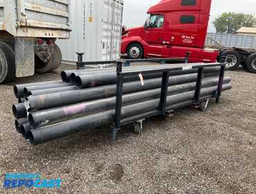 Metal rack on casters with (16) 6” ID poly irrigation pipes lengths from 11’ 4” to 15’ 6”, rack...
