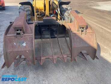 Used Ammbusher grapple, model T72, s/n. 2199, 72'' wide, has new couplers and connecting hoses.