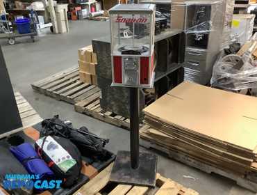 Snap-on vending dispenser on a stand, only takes one 25 cent coins only, 11”x11”x54.5”H