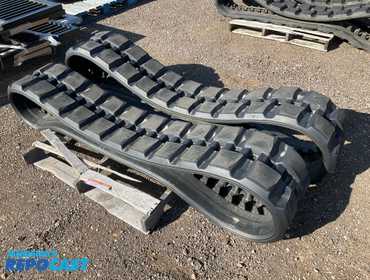 (2) Bridgestone 15”W rubber tracks p/n V0511-2851, came off a Kubota SVL75 skid steer, very...