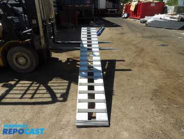 New Aluminum ramp, 9' x 15" x 3-1/3" 10,000lb weight cap.