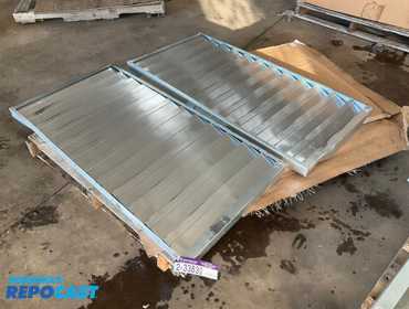 (2) Dayton roof/wall backdraft dampers, both are unused but have some damage, approx 50” x 25” each