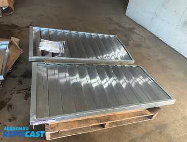 (2) Dayton roof/wall backdraft dampers, both are unused but have some damage, approx 50” x 25” each