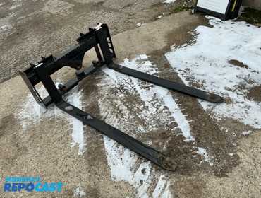 New Wolverine Universal Skid Steer Quick Attach Fork Carriage with (2) 60” Forks, has 2” Receiver...