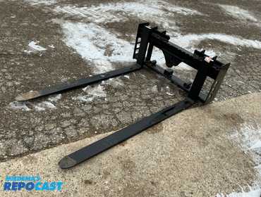 New Wolverine Universal Skid Steer Quick Attach Fork Carriage with (2) 60” Forks, has 2” Receiver...