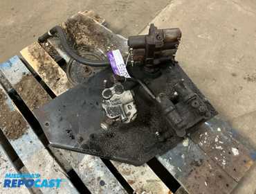 Belt Driven Hydraulic Pump bolted to bracket, has two electric actuated valve blocks