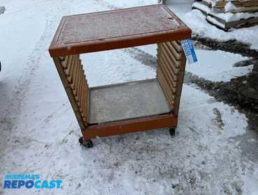 Rolling cart for full size sheet pans. Comes with one sheet pan