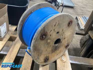 New unused 1/4” coated cable, approx 200’, wood spool is 19-1/2”D x 10”