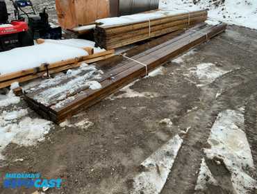 Bundle of 5 1/2” x 1 1/2” Treated Lumber, all around 20’ 