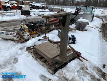 Antique scale on wheels, can weigh from 0-100 lbs. and (2) antique sickles Measuring 59” long...