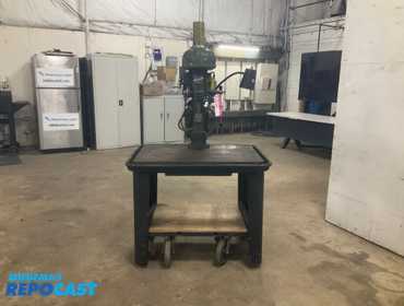 Delta drill press mounted on a 24” x 36” cast iron table on casters, keyless drill chuck, 120...