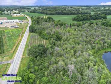 LASTBIDrealestate.com Online Real Estate Auction on August 26, 2025 of 5.7 Acres in Eau Claire, MI