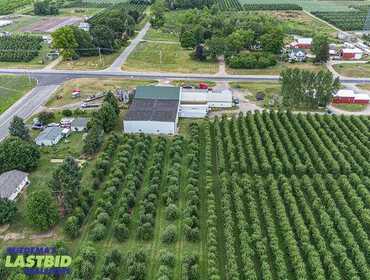 18,000 SF Packing Facility and 8 Acres of Apple Trees Selling in 2 Parcels, scheduled to end at 7 p.m. on August 26, 2025.