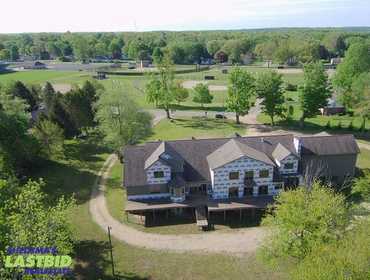 LASTBIDrealestate.com Online Real Estate Auction October 15, 2025 of a 22,000 SF Partially Finished Waterfront Home on 3.3 Acres in Decatur, MI