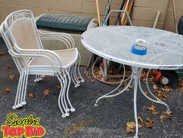 Shoreline Top Bid | Iron patio set. Table and 4 chairs...